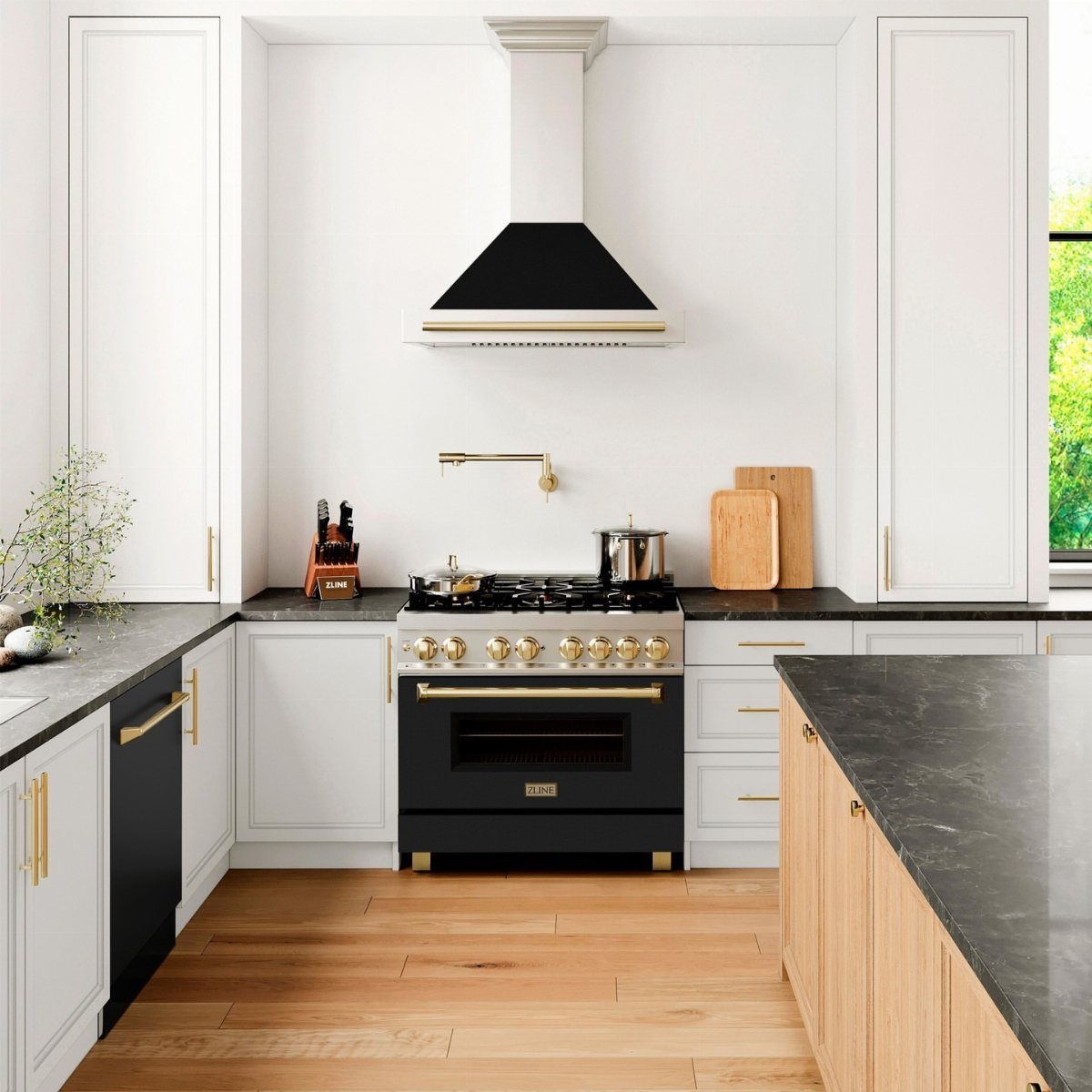 Black and white range hood centered above a black stove in a modern kitchen