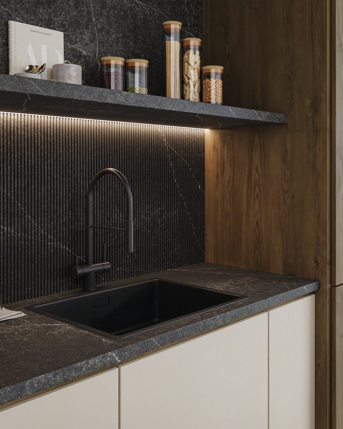 Black fluted backsplash behind a black sink and dark marble countertop with white cabinets.