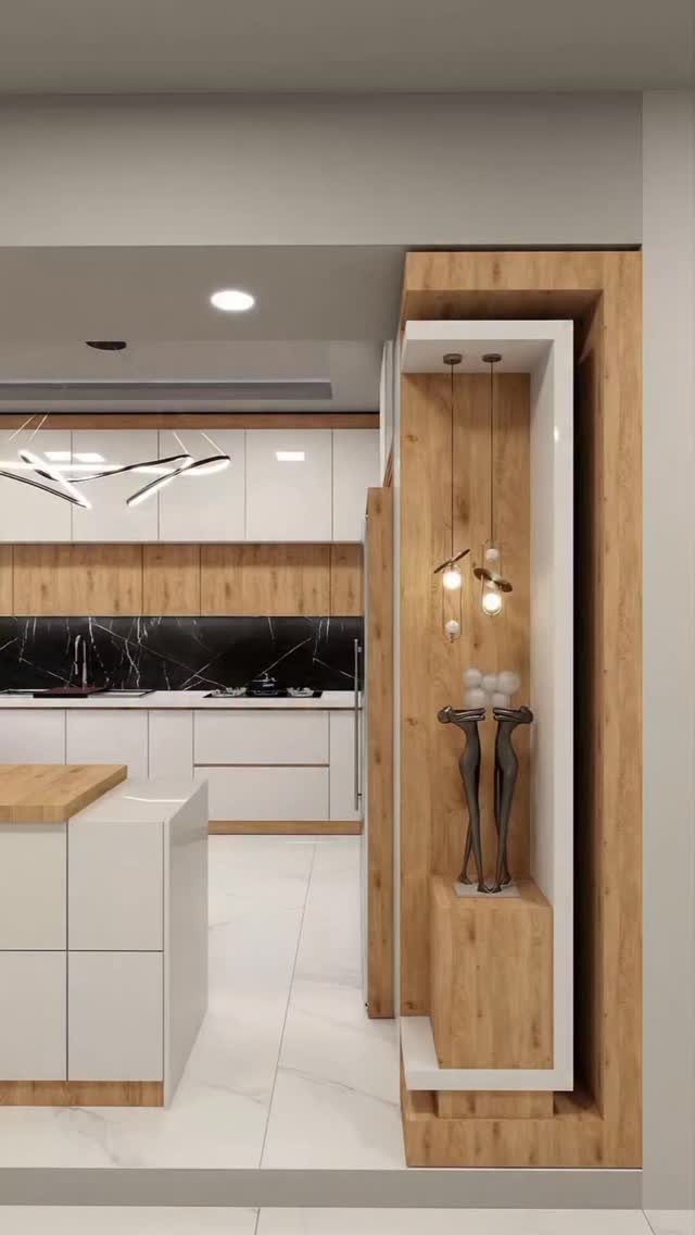 Modern kitchen with white cabinets, black marble backsplash, and light wood accents.