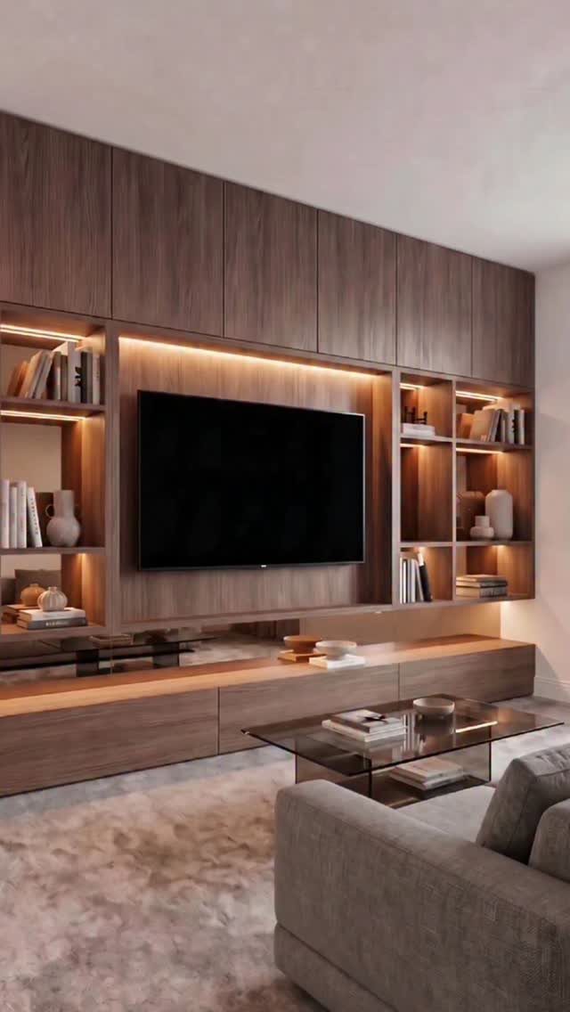 Brown wood entertainment center with closed upper cabinets and open shelving around a TV