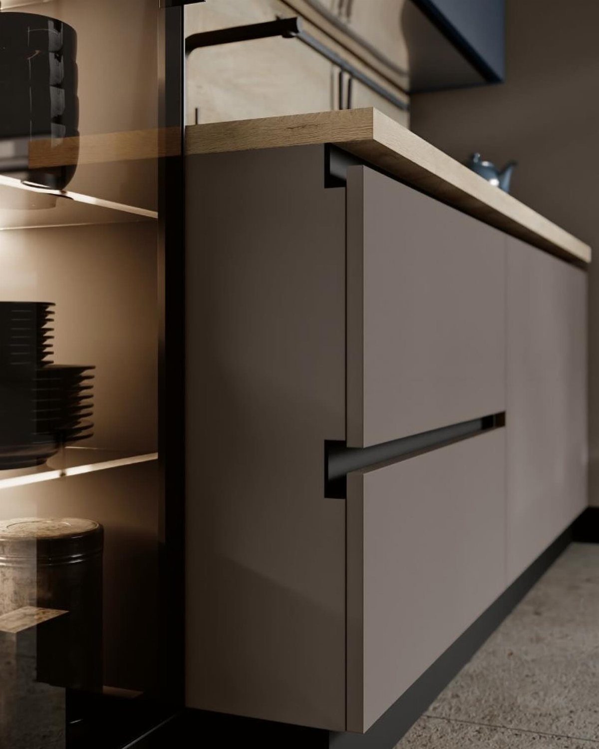Matte grey handleless kitchen cabinets featuring a black Gola profile grip rail.