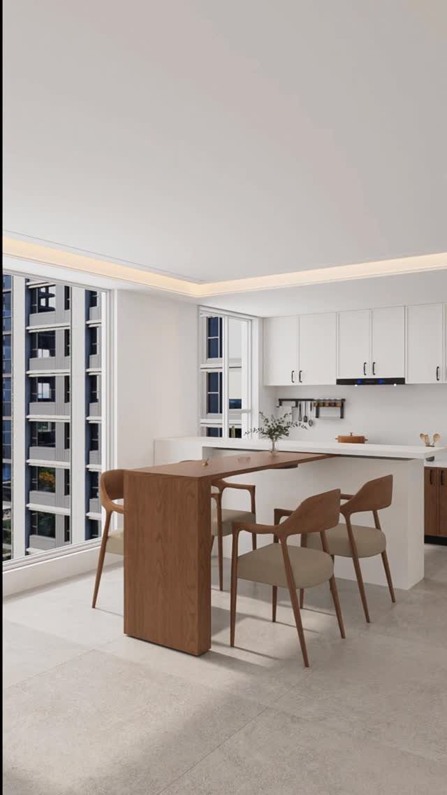 Modern white kitchen island with a wooden breakfast bar and three matching chairs.