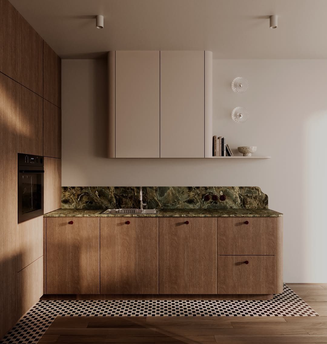 Kitchen with wood-grain lower cabinets and beige upper cabinets with green marble backsplash.