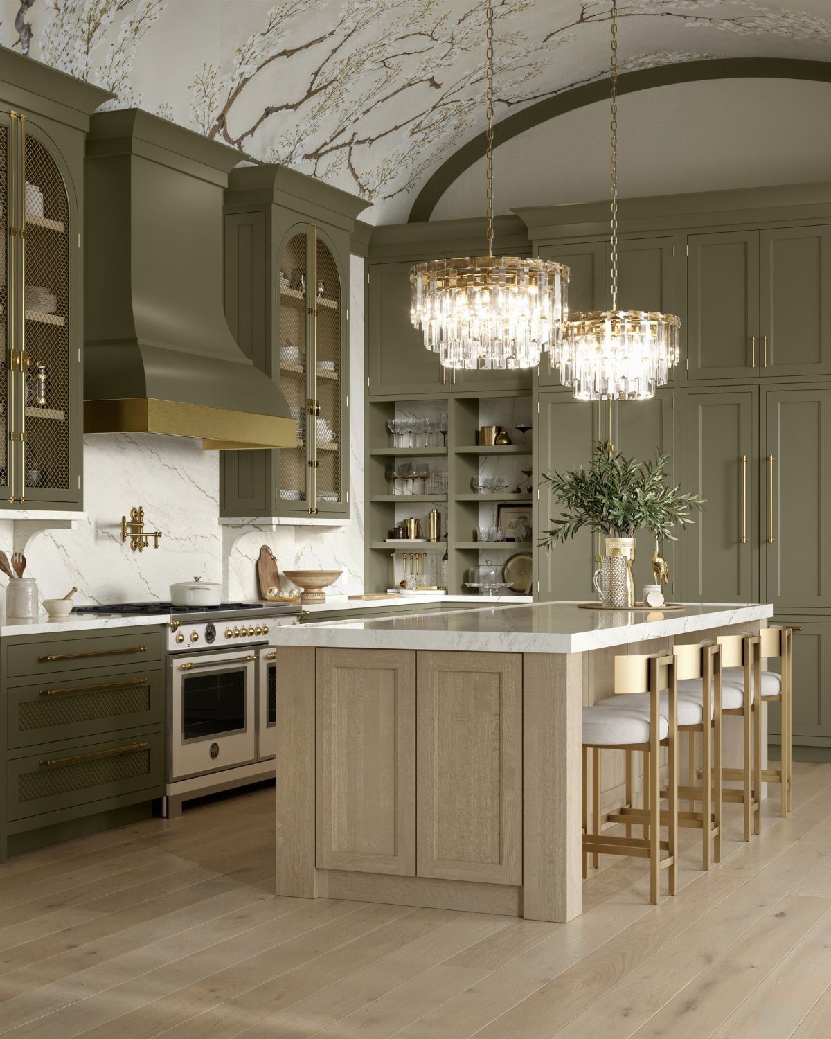 Olive green kitchen cabinets paired with a light wood kitchen island and marble countertops.